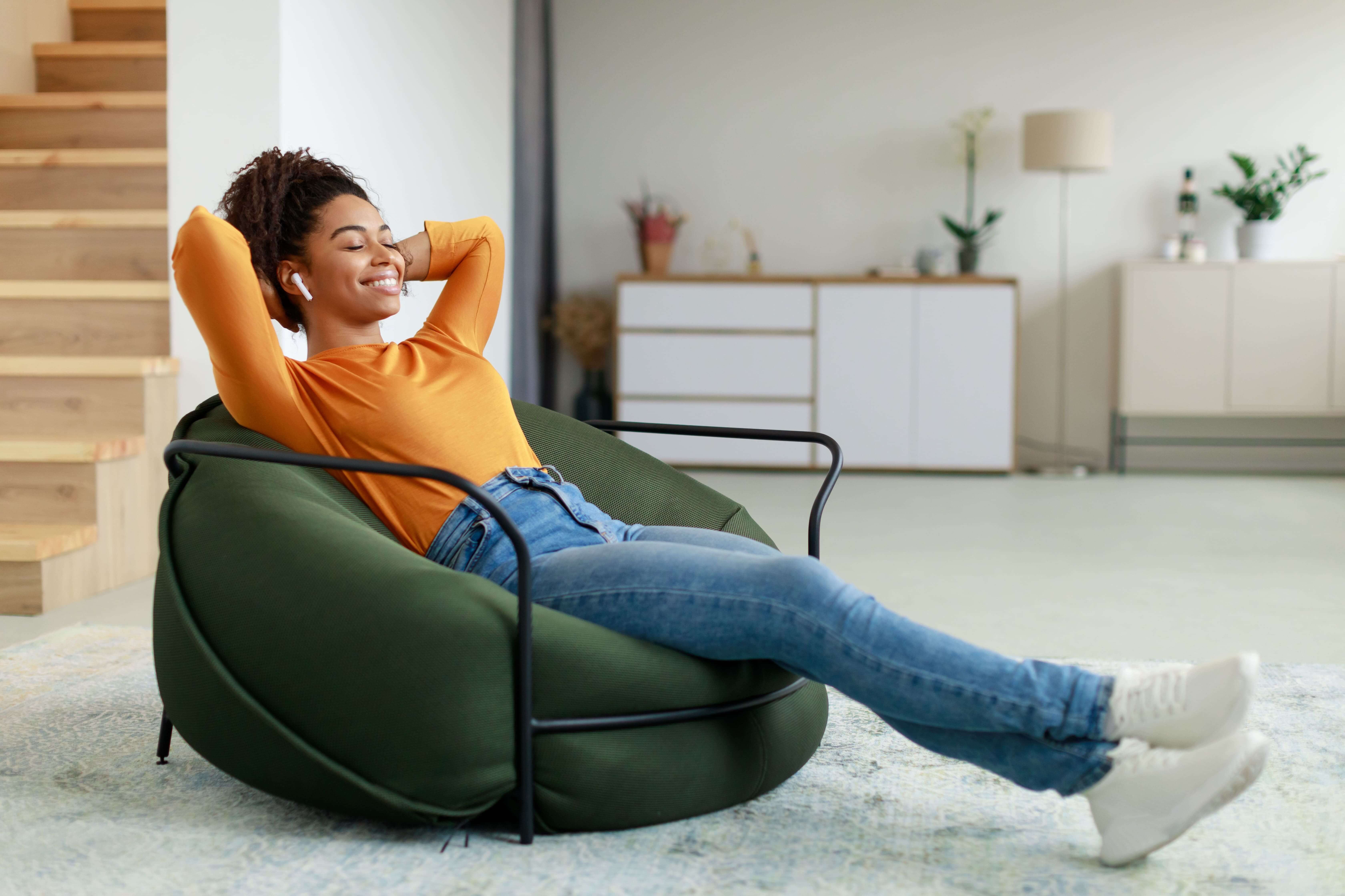 Calm Black Women taking rest in bean bag